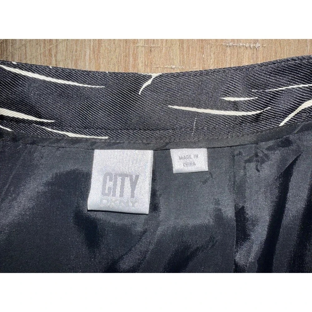 NWT DKNY Black Cream Tulip Print 100% Silk A-Line Skirt Box Pleated Size 4 $109